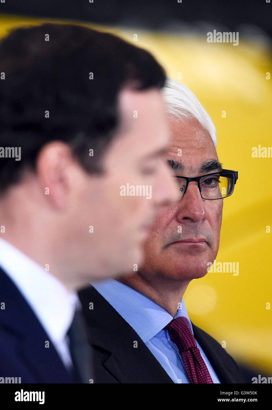 Chancellor George Osborne (left) and former Chancellor Alistair Darling at a pro-Remain event at the Hitachi Rail Europe plant in Ashford, Kent. Stock Photo