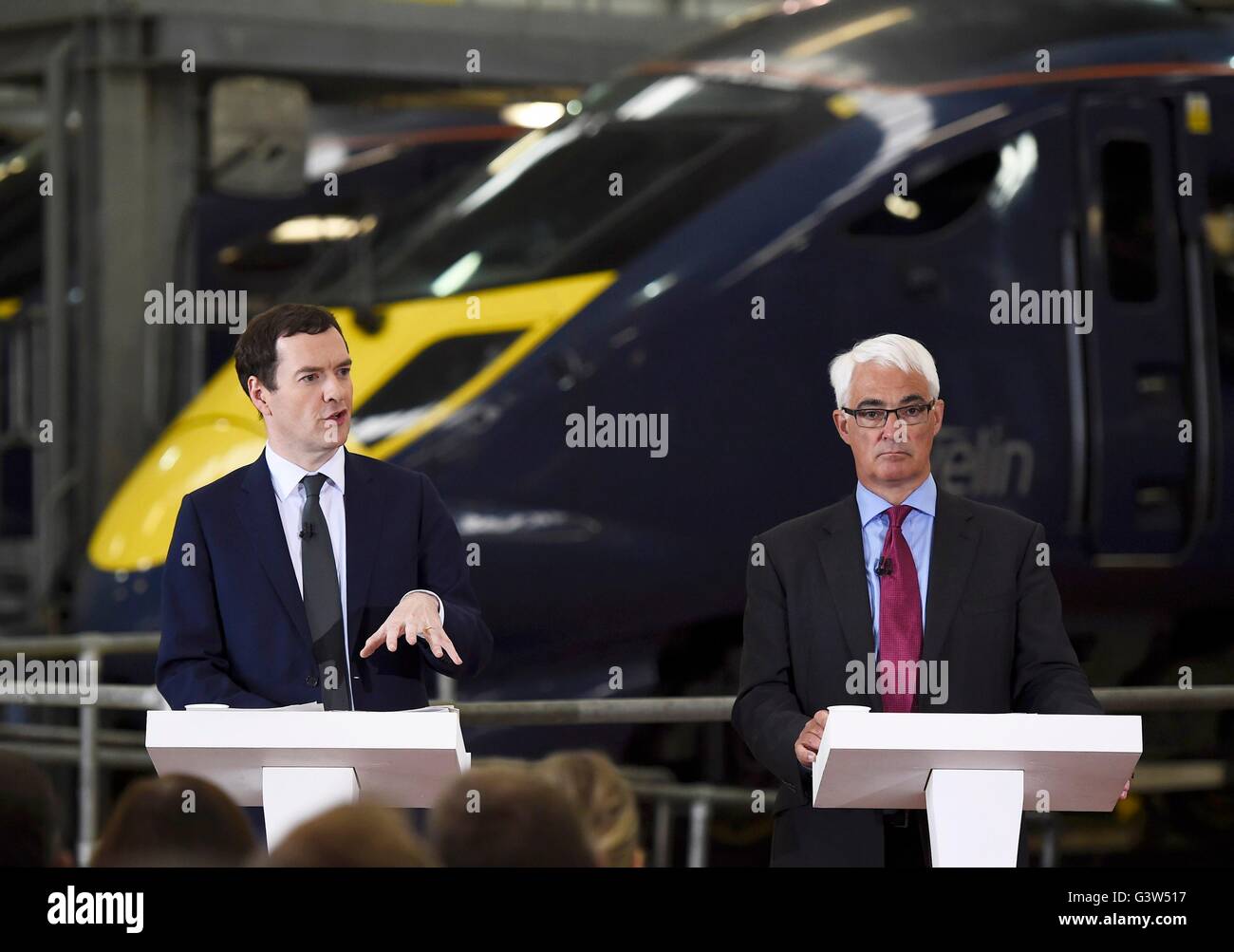 Chancellor George Osborne (left) and former Chancellor Alistair Darling at a pro-Remain event at the Hitachi Rail Europe plant in Ashford, Kent. Stock Photo