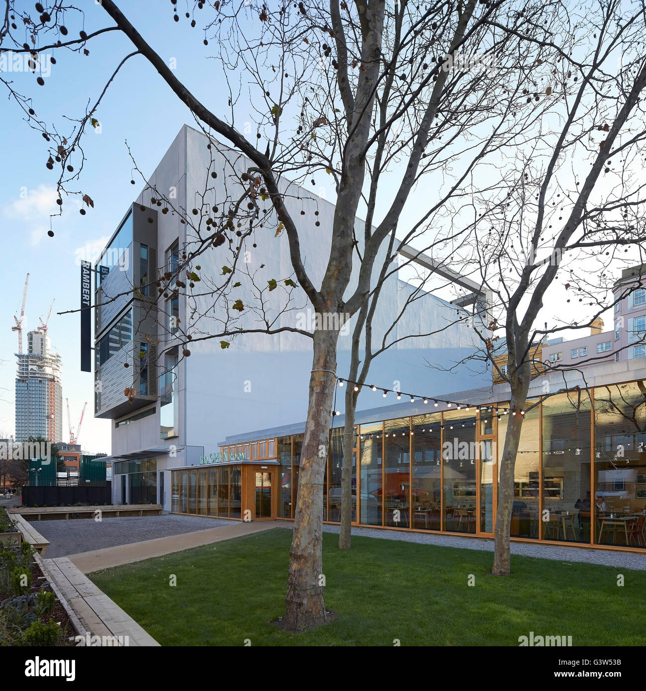 Facade perspective with Rambert Dance Company in rear. The Green Room, London, United Kingdom. Architect: Benjamin Marks, 2015. Stock Photo