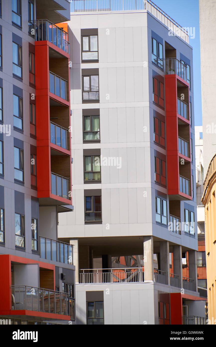 Modern apartment buildings with red details on the facade Stock Photo ...