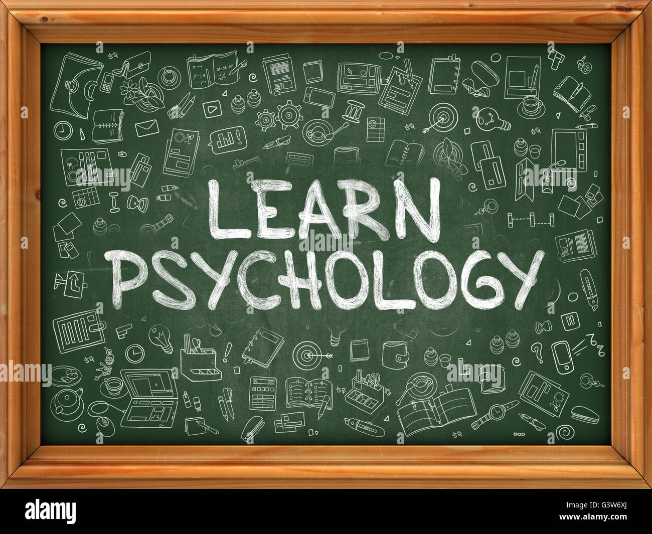 Green Chalkboard with Hand Drawn Learn Psychology. Stock Photo