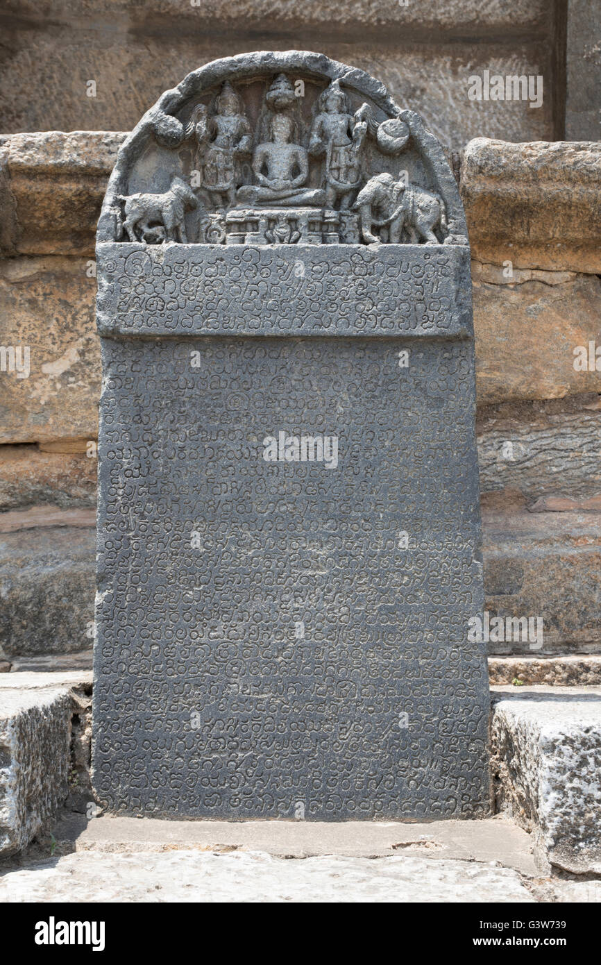Carved inscriptions in Kannada on the stone pillar at the entrance of