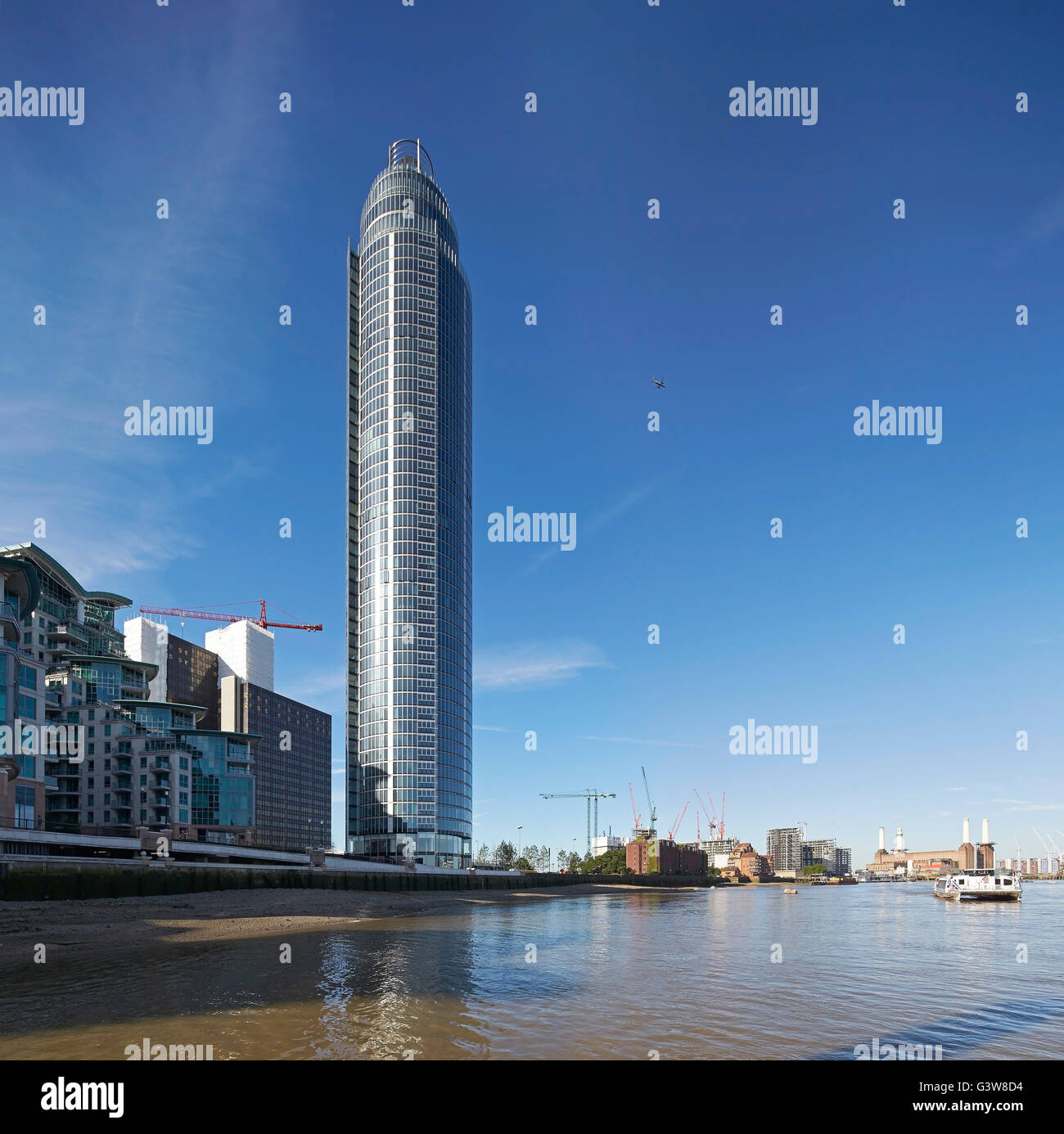 View across river Thames towards high-rise and context. St George Wharf Tower, London, United Kingdom. Architect: Broadway Malyan Limited, 2014. Stock Photo