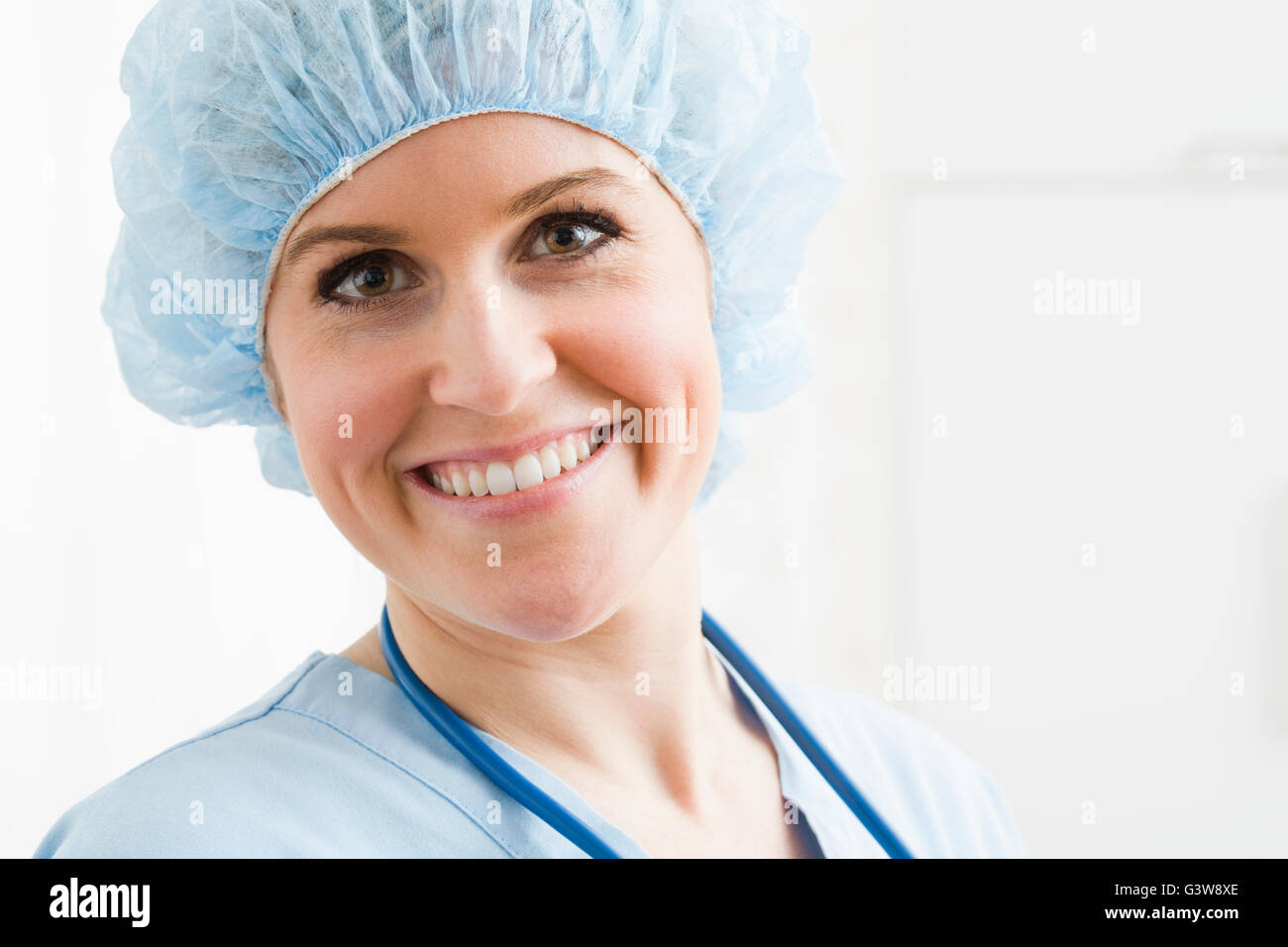 Portrait of female nurse in surgical cap Stock Photo