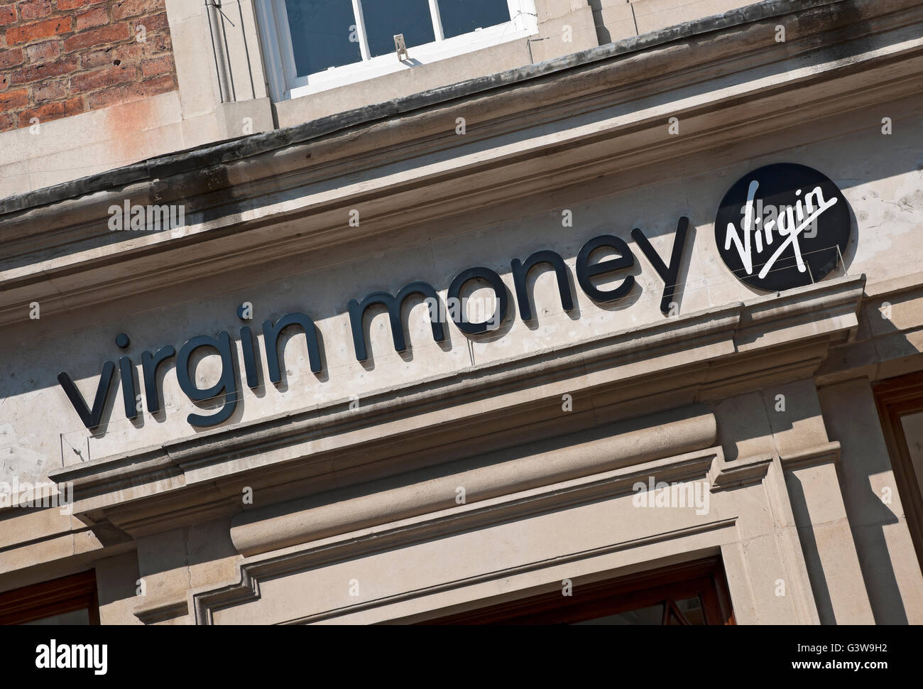 Close up of Virgin money bank sign signage exterior England UK United Kingdom GB Great Britain Stock Photo