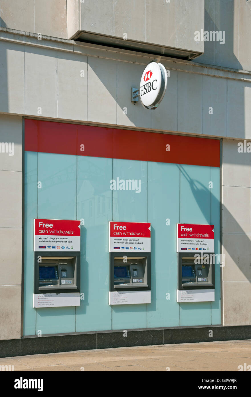 HSBC bank 3 three ATM ATMs outside exterior cash machine machines branch England UK United Kingdom GB Great Britain Stock Photo