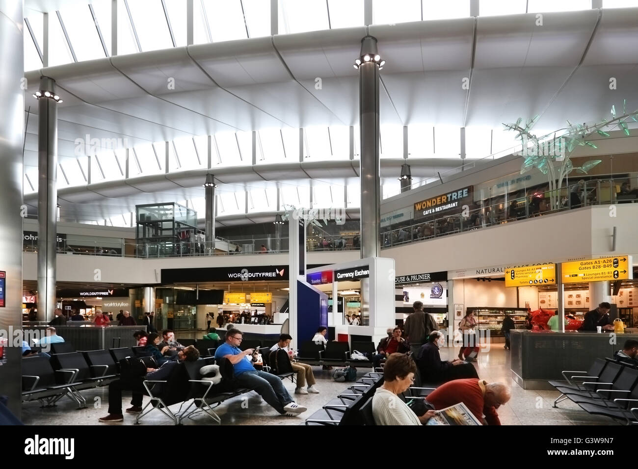 England Heathrow Airport Terminal Two Passengers Waiting For Flights In