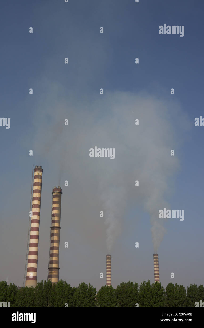 Chimneys from an oil fired electric power station Stock Photo