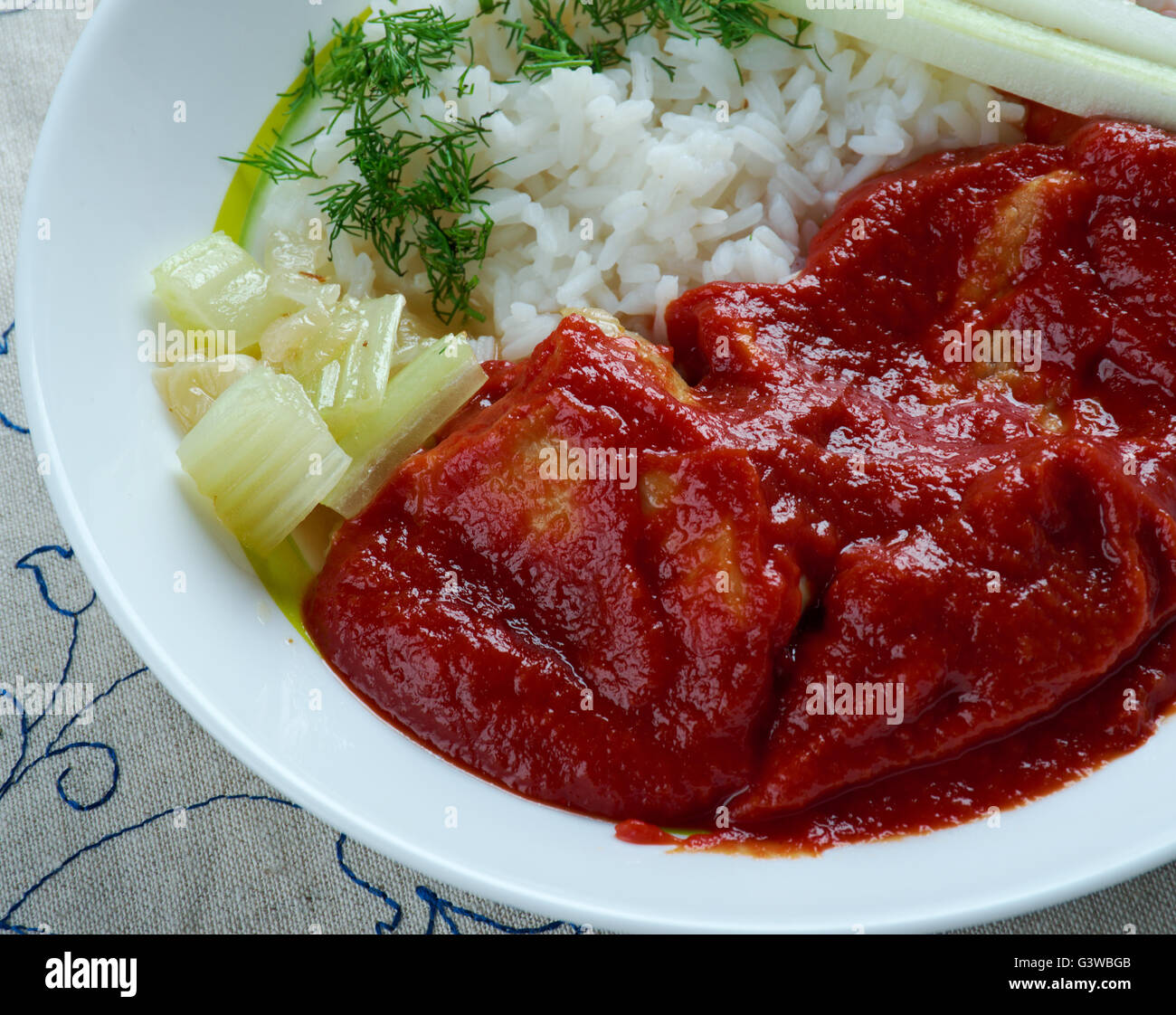 Chileajo de cerdo dish originating from Oaxaca, Mexico.pork boiled in water and cooked in a thick sauce made of toasted guajillo Stock Photo