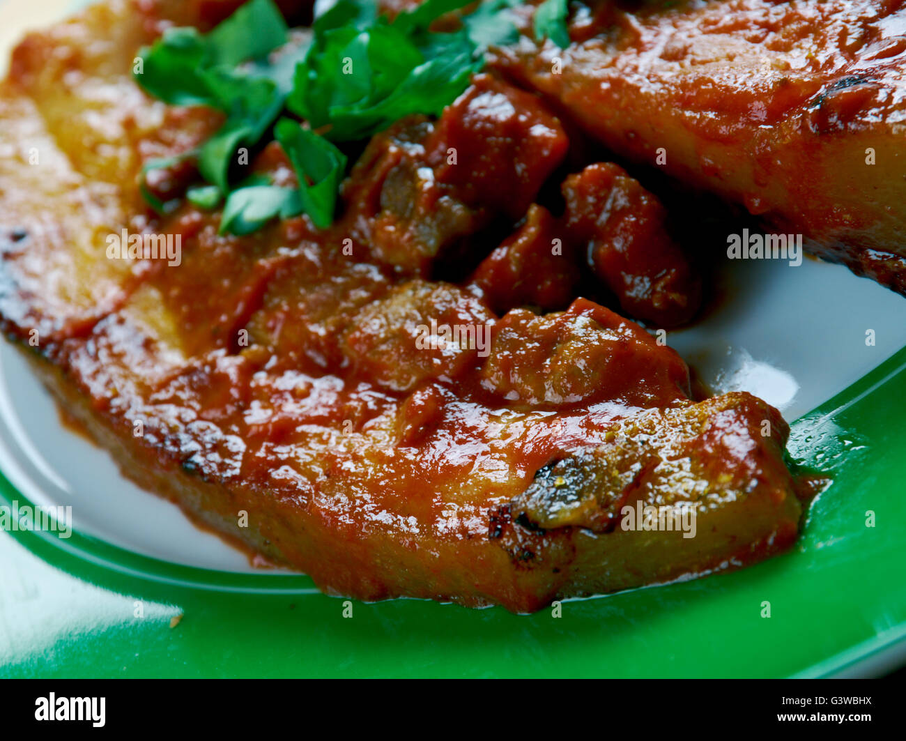 Chicharron en salsa dish generally consisting of fried pork belly or