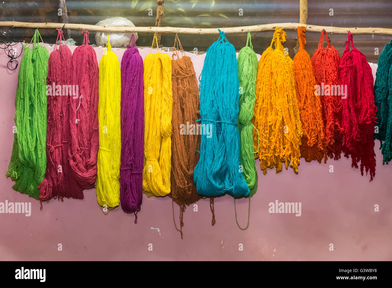 Colorful yarns traditionally made of Llama and Alpaca in Andes Mountains near Cusco, Peru Stock Photo