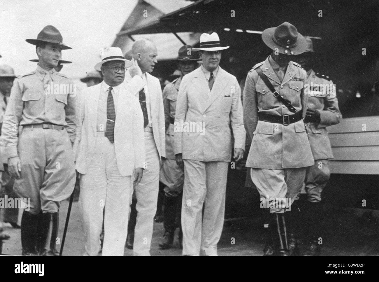 Dwight David Eisenhower (center, no hat) and General Douglas MacArthur (center, facing forward) in the Philippines. Stock Photo