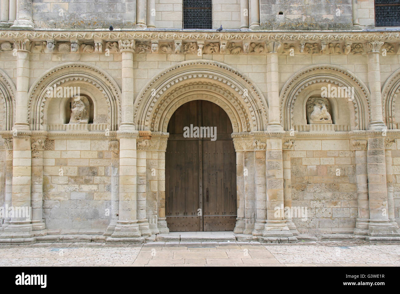The gate of the Notre-Dame-de-Surgères church in Surgères (France). Stock Photo