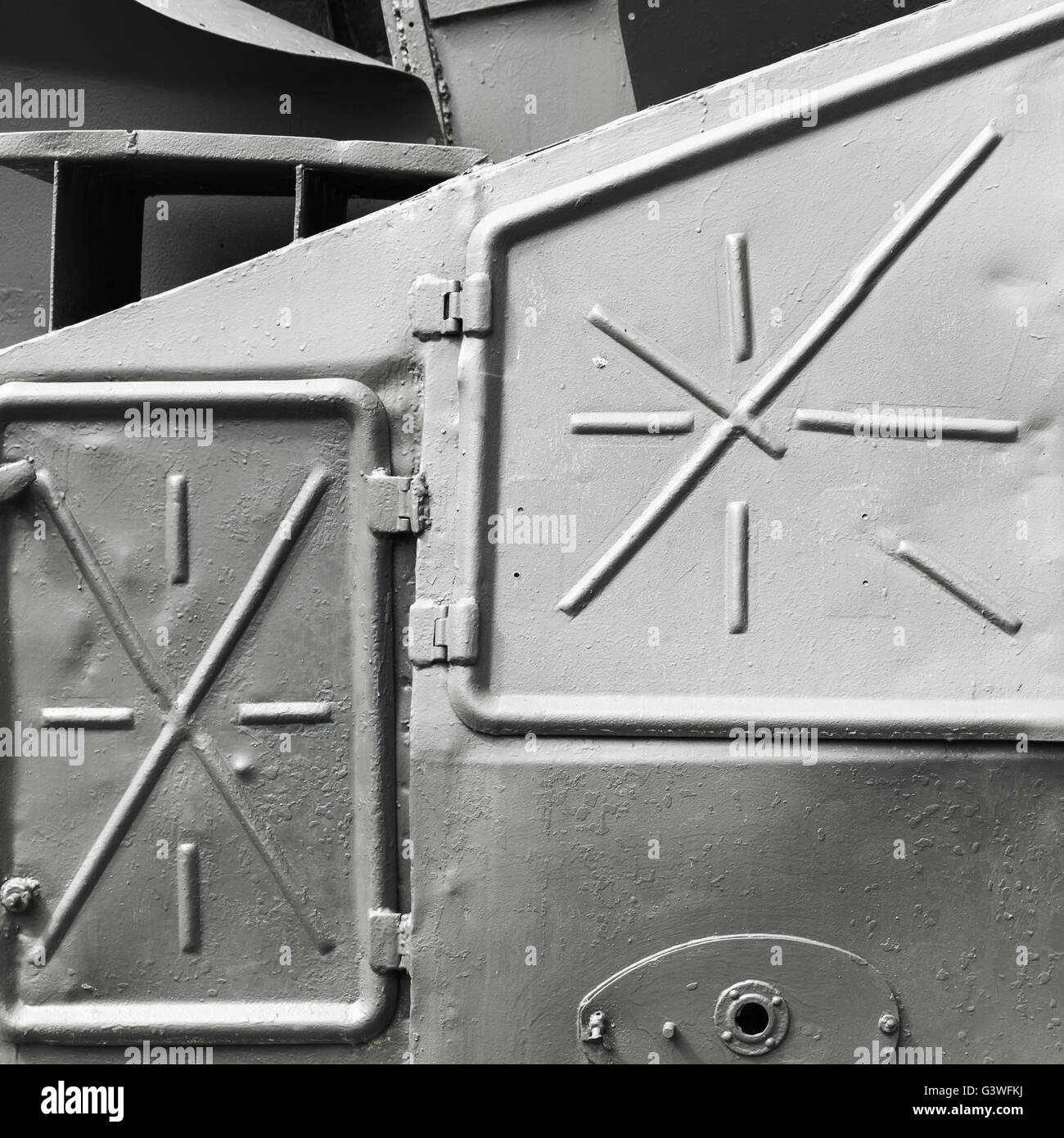 Abstract gray industrial metal background texture with manholes, details of Russian armored train from WWII time Stock Photo