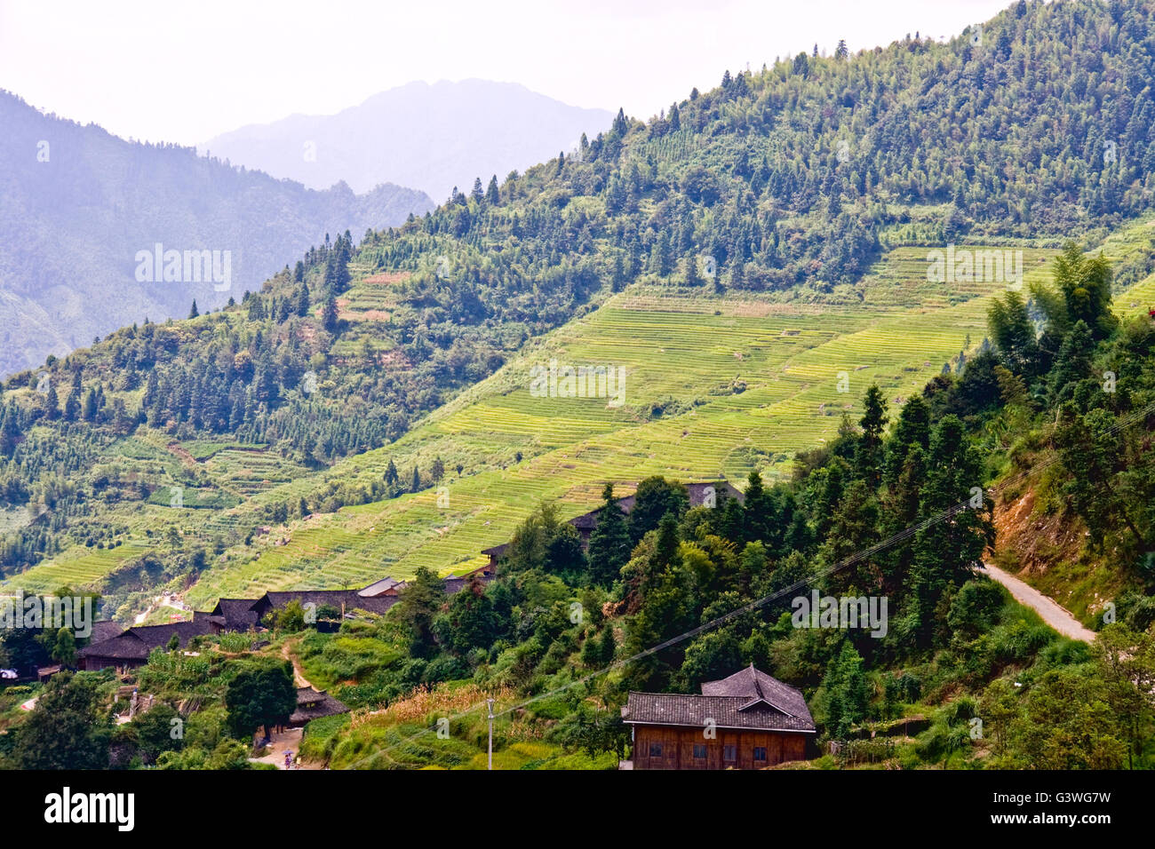 Village and rice terraces on the mountains. Stock Photo
