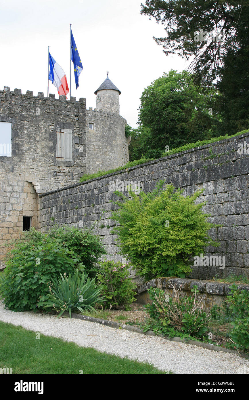 Surrounding wall and turret in Surgères (France). Stock Photo
