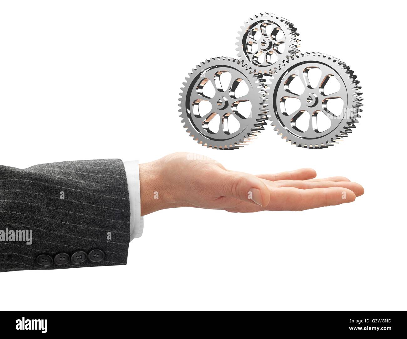hand with metal gearbox with clipping path. Stock Photo