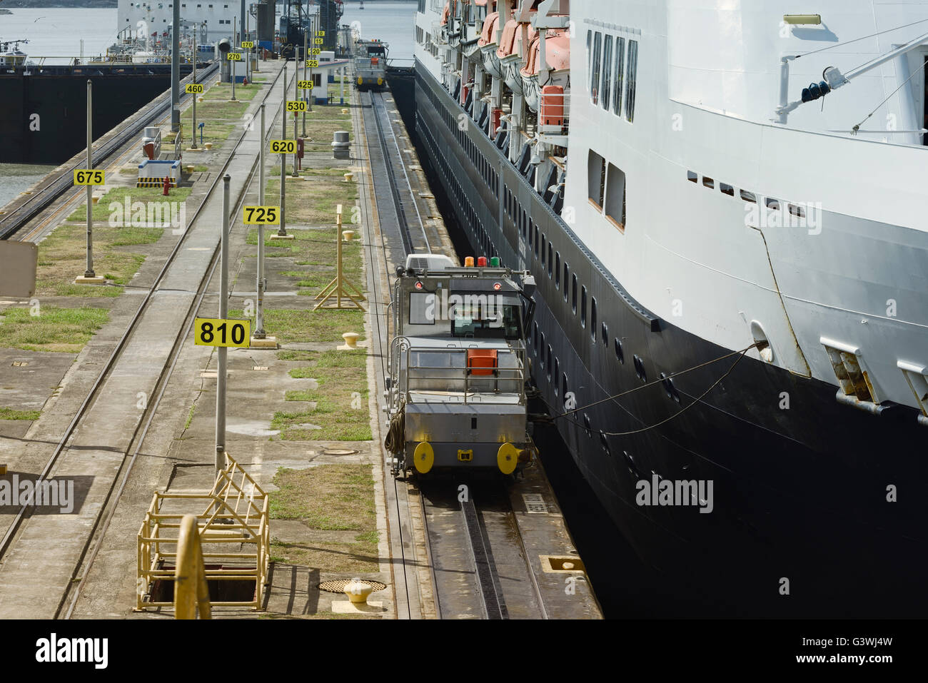 Electric mules steering large cruise ship at the first locks on Panama ...