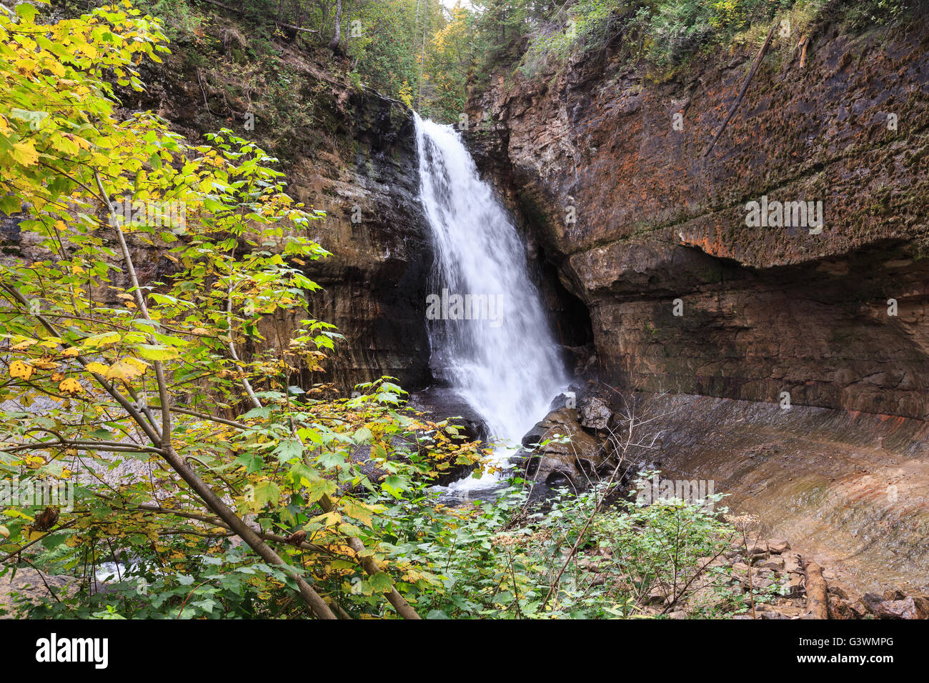 Miners Falls at Pictured Rocks National Lakeshore - Upper Peninsula of Michigan. Miners Falls cascades over rock face and rushes Stock Photo