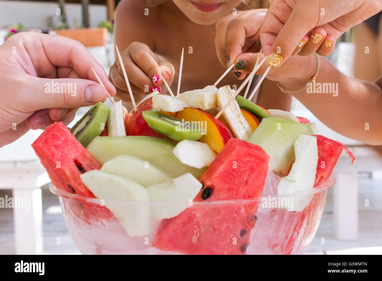 Eating fruit salad Stock Photo Alamy