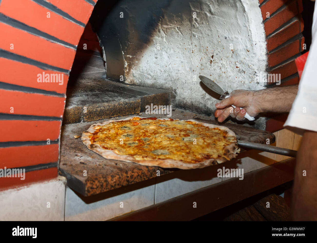 Bake pizza in the furnace Stock Photo Alamy