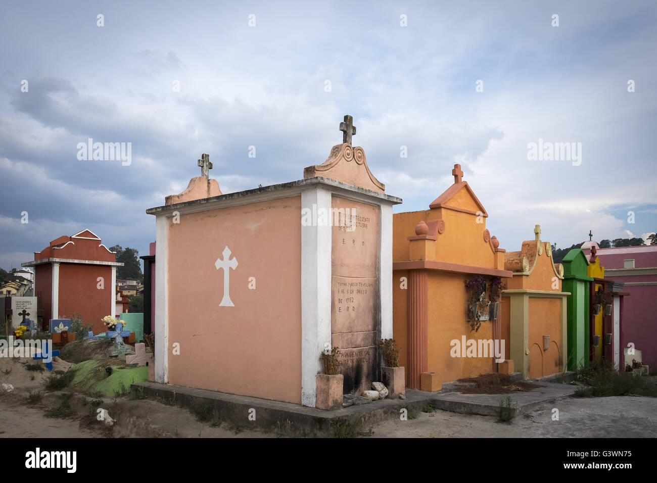 Colorfully painted tombs in the cemetery of Chichicastenango. Guatemala Stock Photo