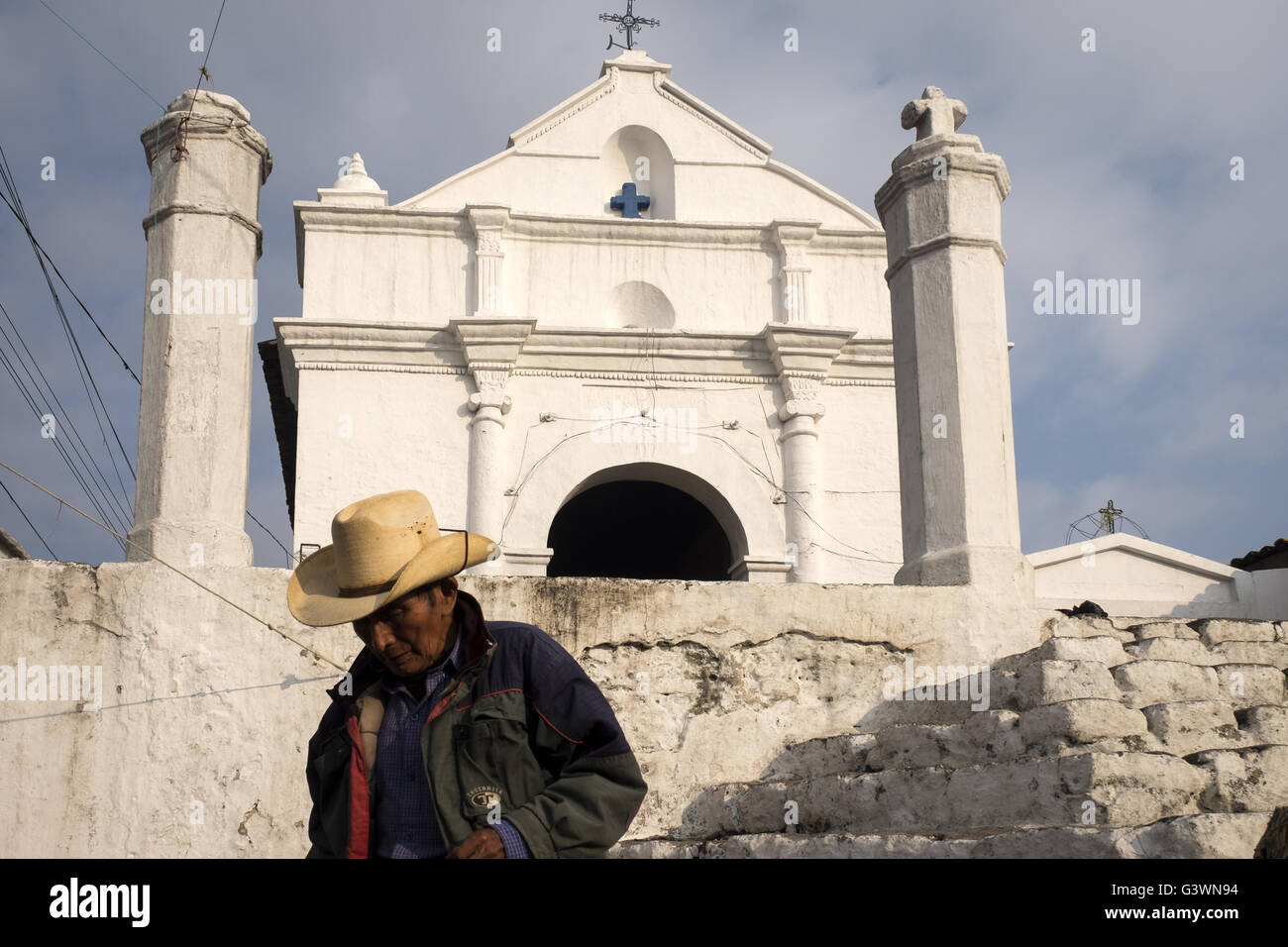 A man walks to Calvary Church in Chichicastenango. Stock Photo