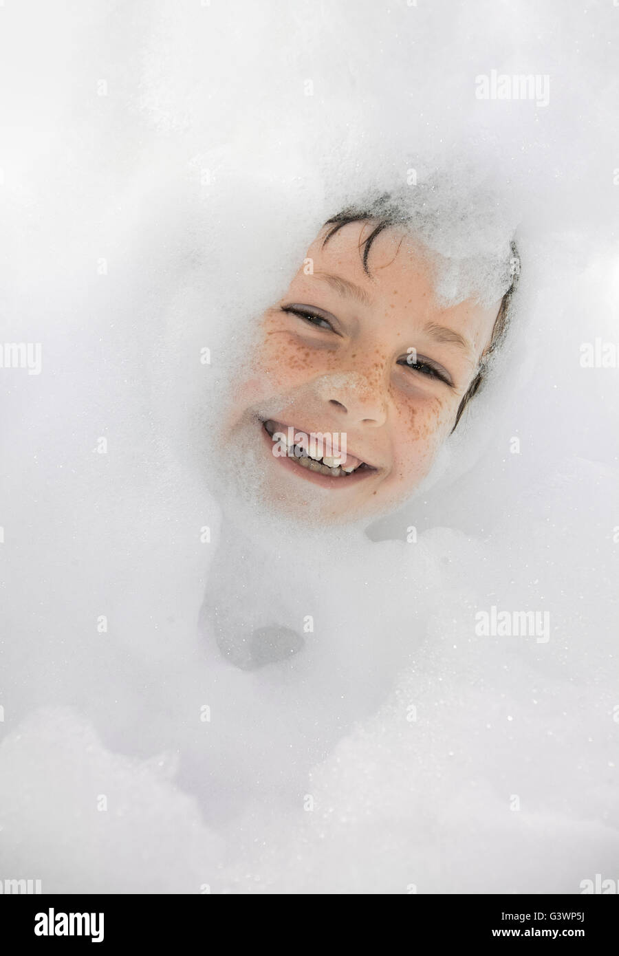 Boy taking bubble bath Stock Photo Alamy
