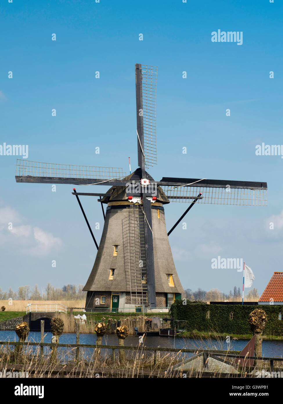 Photographer with tripod at Kinderdijk