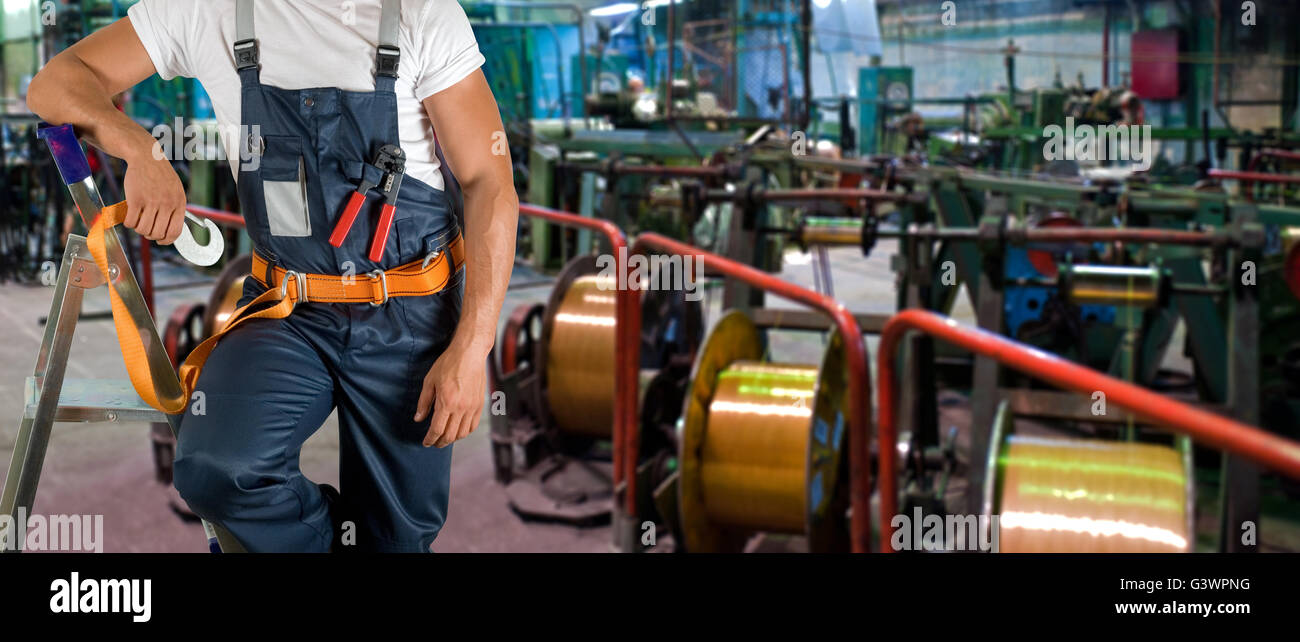 Worker with instruments Stock Photo - Alamy