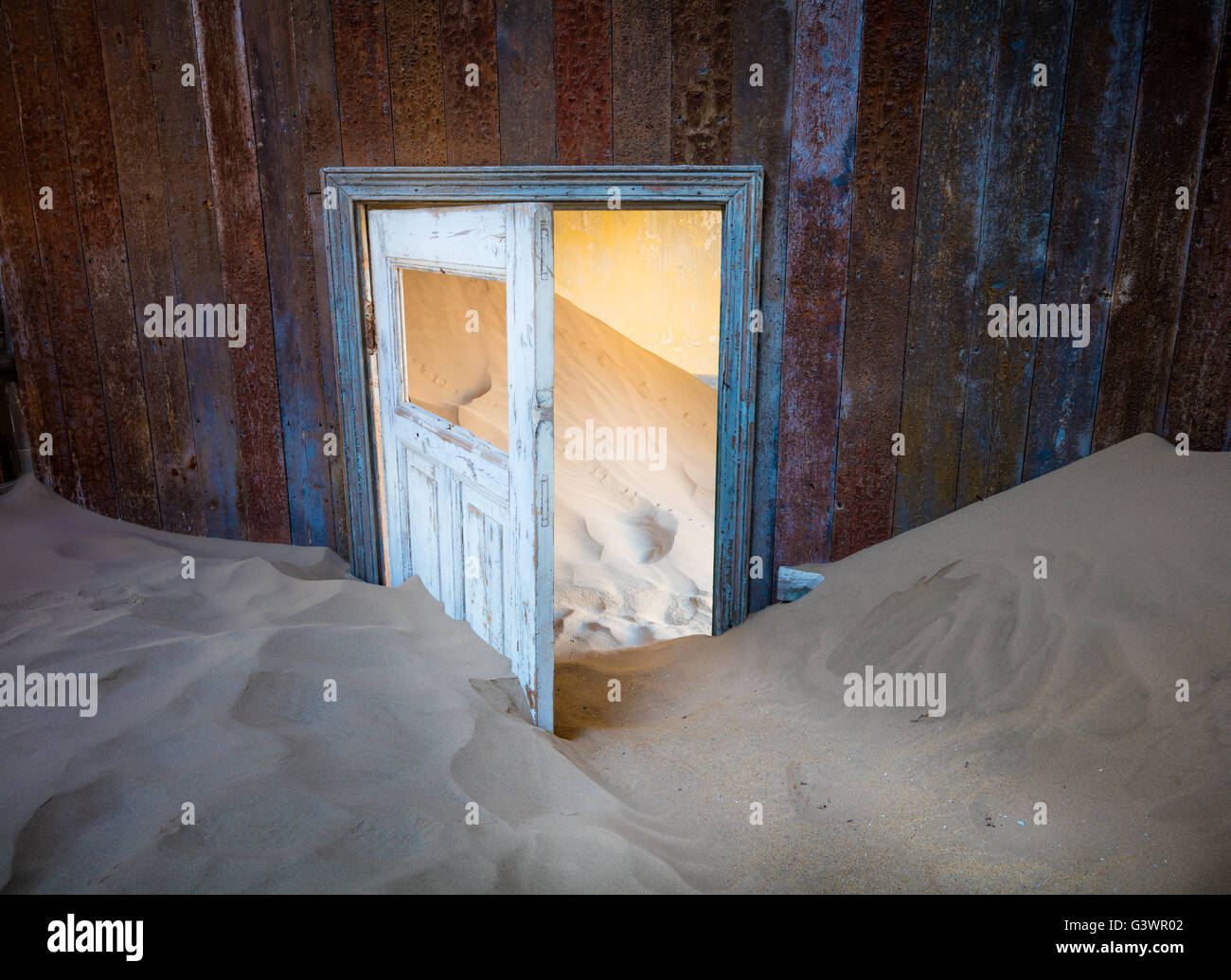 Kolmanskop (Afrikaans for Coleman's hill, German: Kolmannskuppe) is a ghost town in the Namib desert in southern Namibia,. Stock Photo