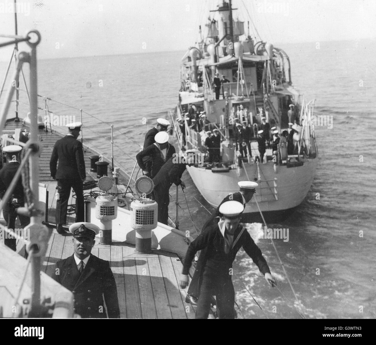 royal navy. preparing a tow on a navy destroyer Stock Photo