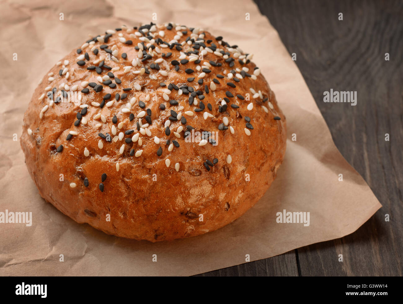Freshly baked bun with sesame Stock Photo