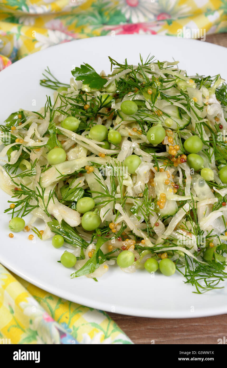 Coleslaw with cucumbers and peas, seasoned with dijon mustard and dill Stock Photo Alamy