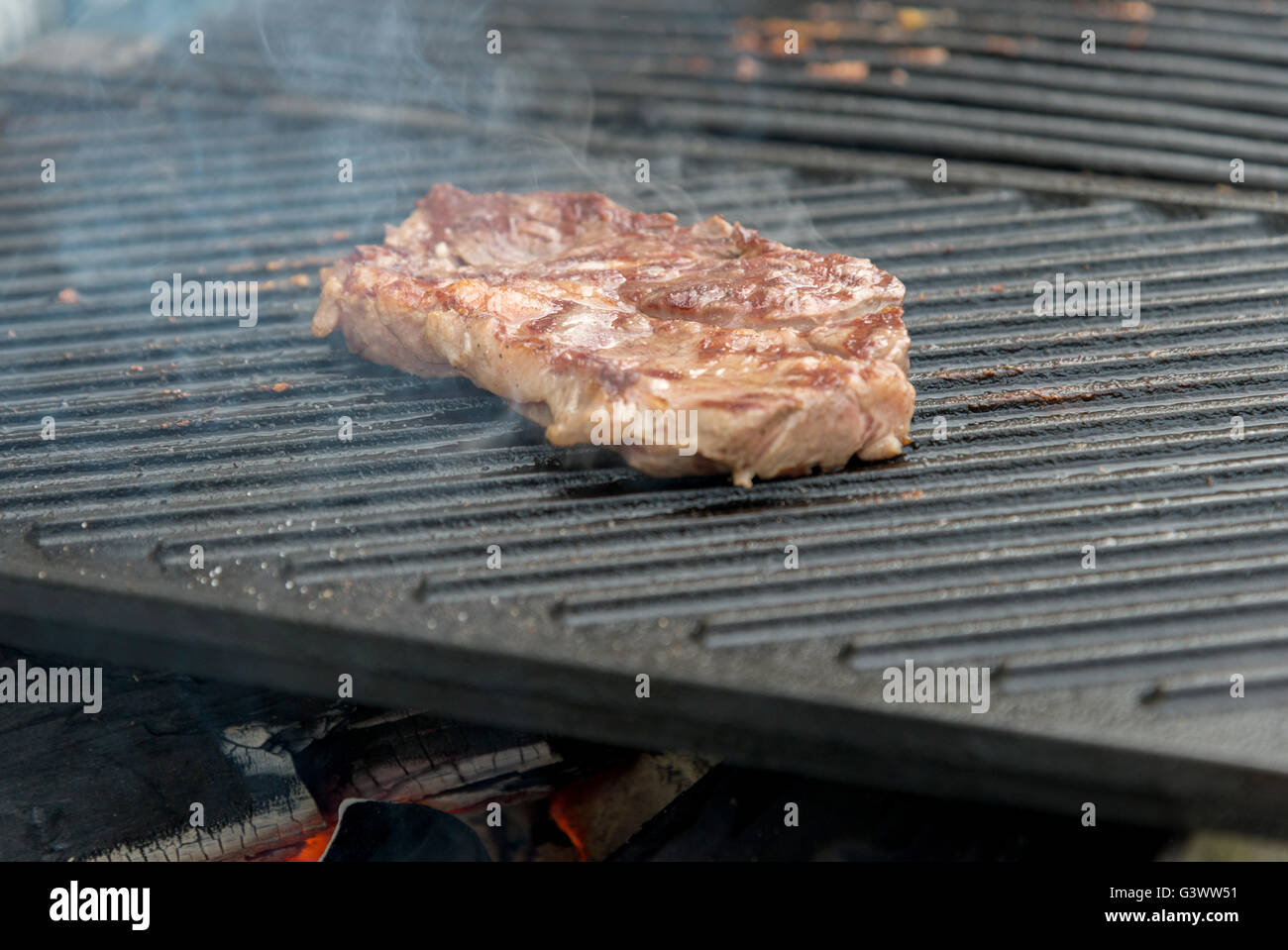 Two tbone florentine beef steaks on the grill Stock Photo Alamy