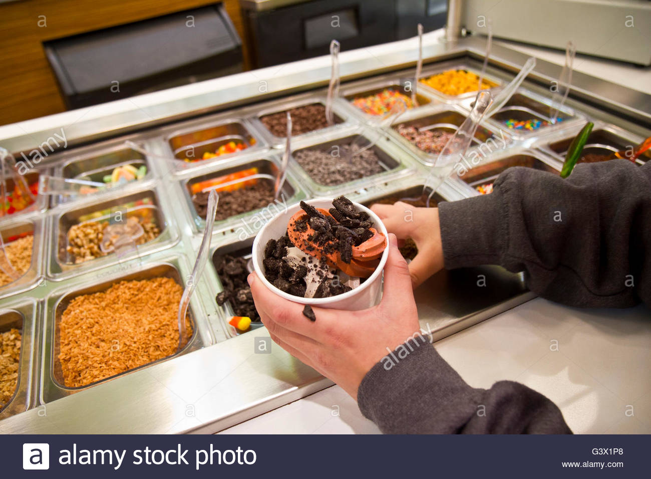 Child Using Hands To Take Candy From Public Ice Cream Shop