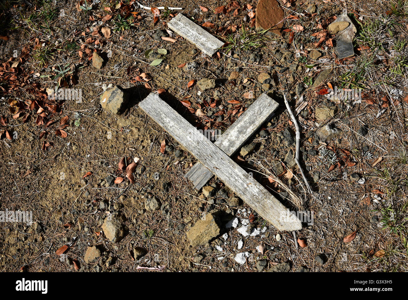 broken cross on the ground in guyra cemetary in new england new south