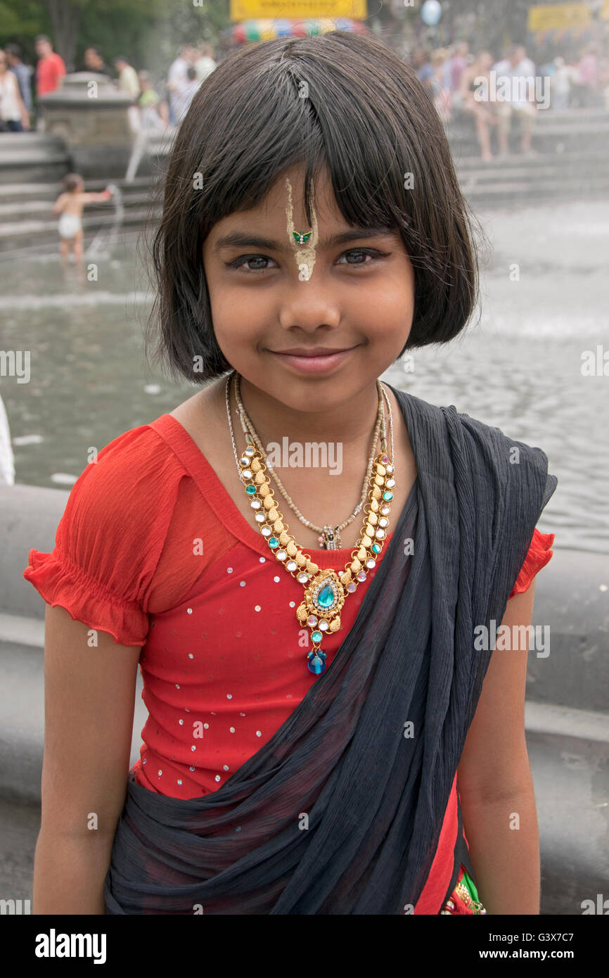 Portrait of a 10 year old girl from Bangladesh in a traditional colorful  dress in Washington Square Park in New York City Stock Photo - Alamy