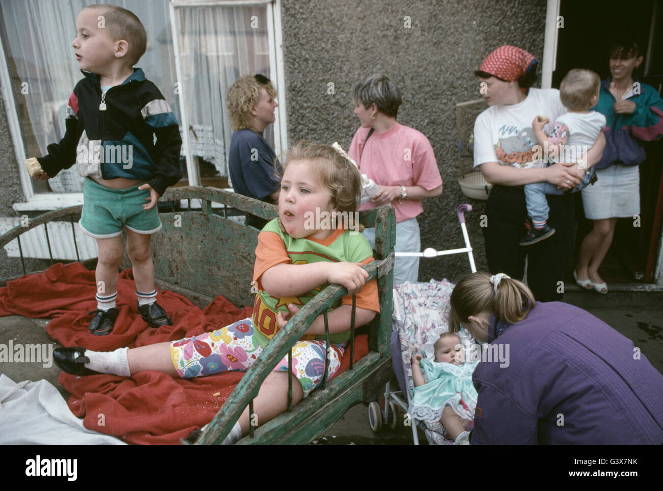 © John Angerson  Holme Wood Housing estate in Bradford, Yorkshire. Back 1998 the Estate had just received a £37.5 million City Challenge fund, that was focused mainly on improving the housing stock and local environment. These images were a document of the residents of area prior to receiving the proposed funding. Holme Wood still has high levels of deprivation, low levels of educational attainment, low rates of economic activity, and high levels of crime. Stock Photo