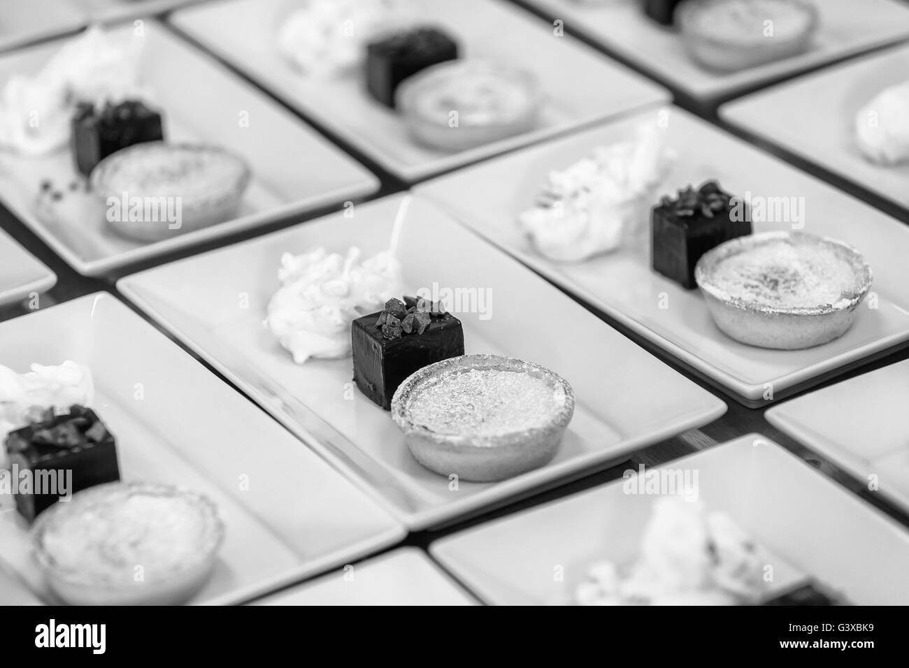 Lemon Tart, Brownie And Mouse Pudding Platter Stock Photo