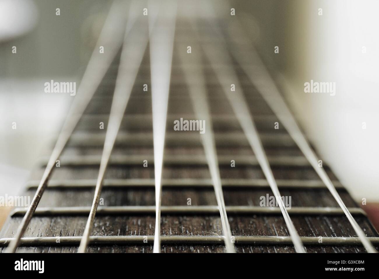 Perspective shot of a Classical Spanish Guitar Neck and strings Stock Photo