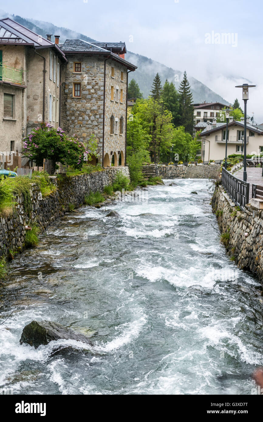 Frigidolfo river flows between stones in Ponte di Legno, Italy Stock Photo