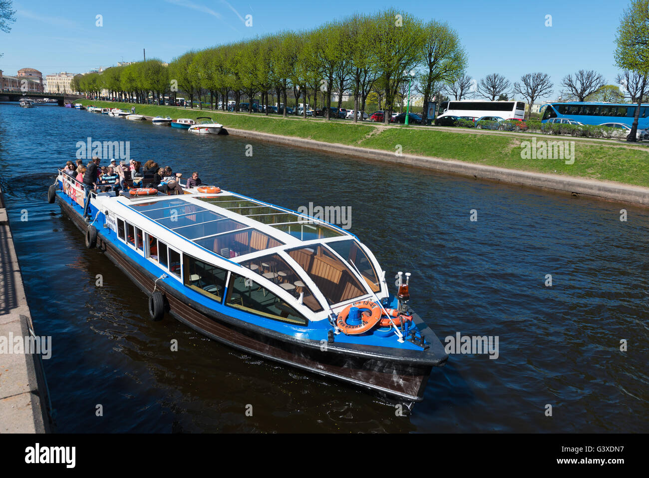 Tour Boat With Tourists On River, St Petersburg Stock Photo