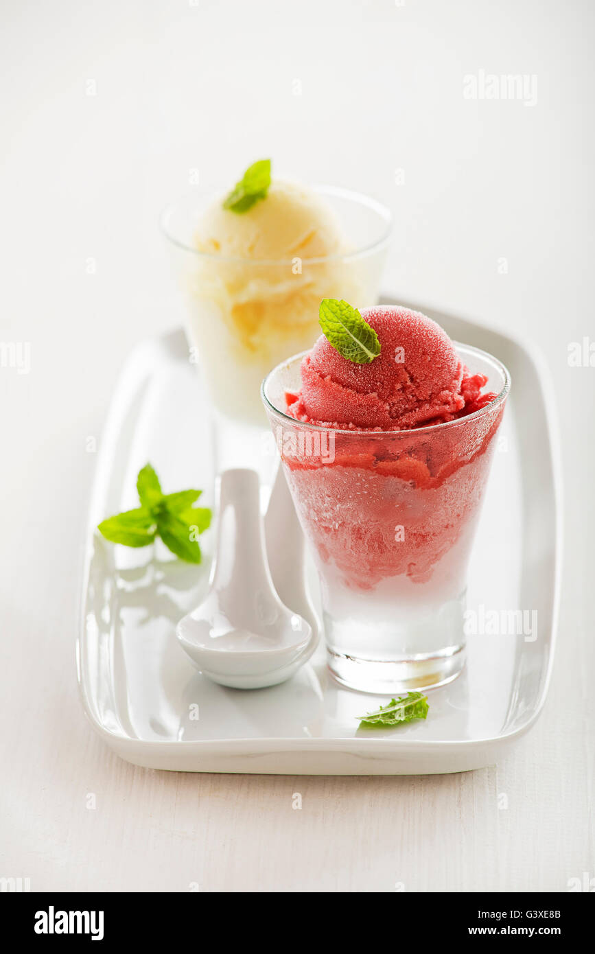 Fresh fruit sorbet ice cream on white background Stock Photo Alamy