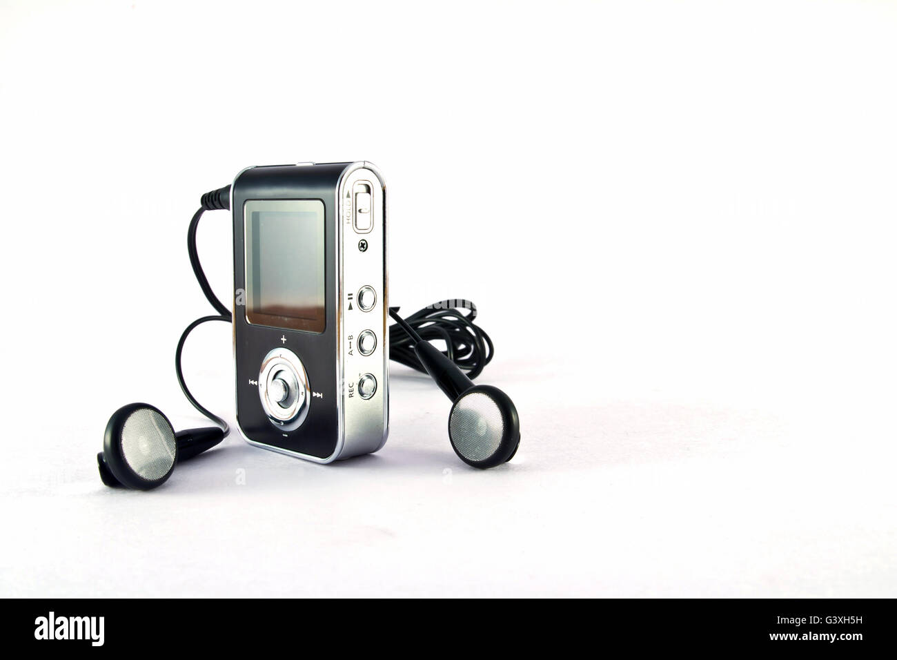 mp3 player and headphones isolated on white background Stock Photo