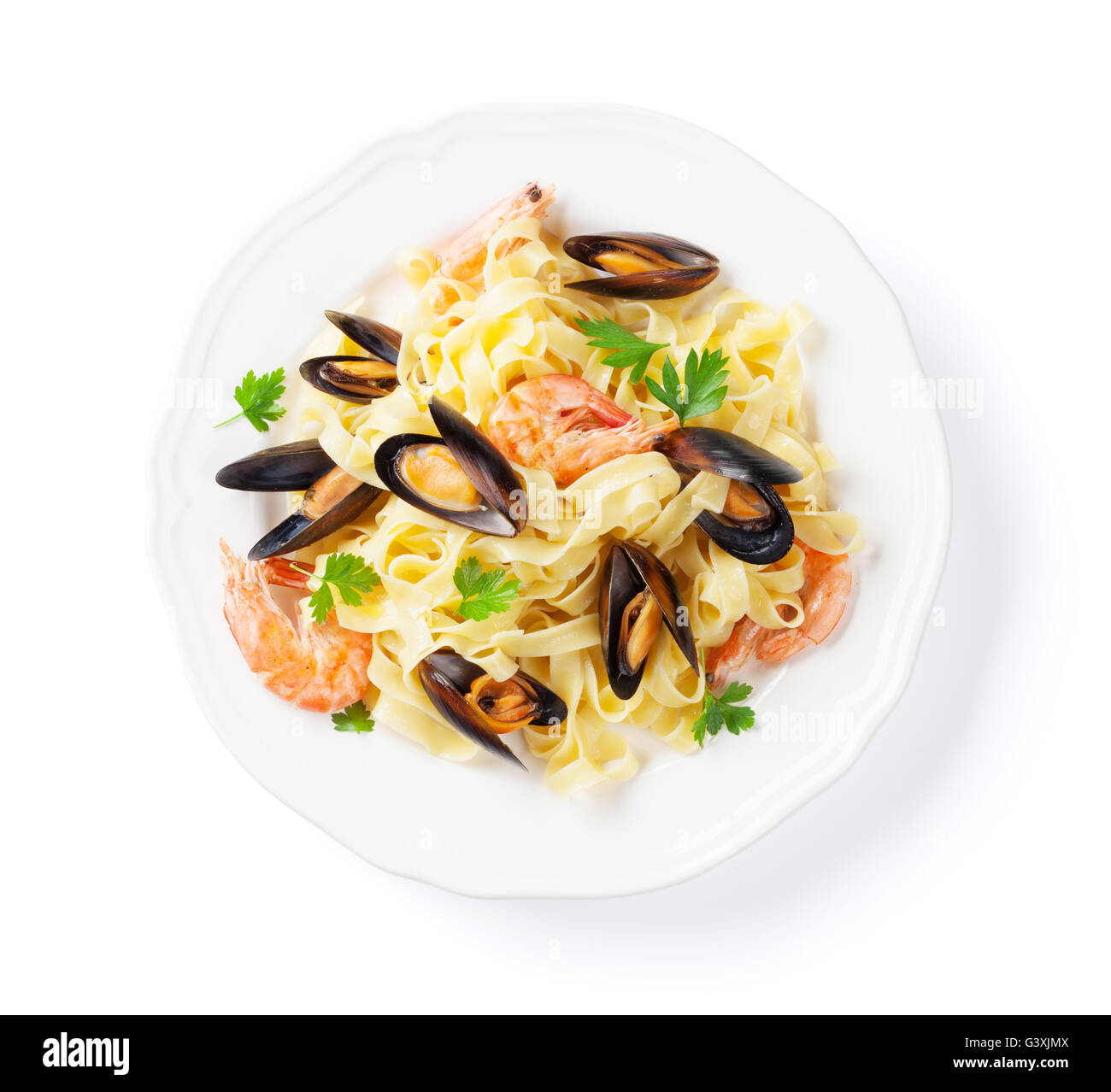 Pasta with seafood. Mussels and prawns. Isolated on white background