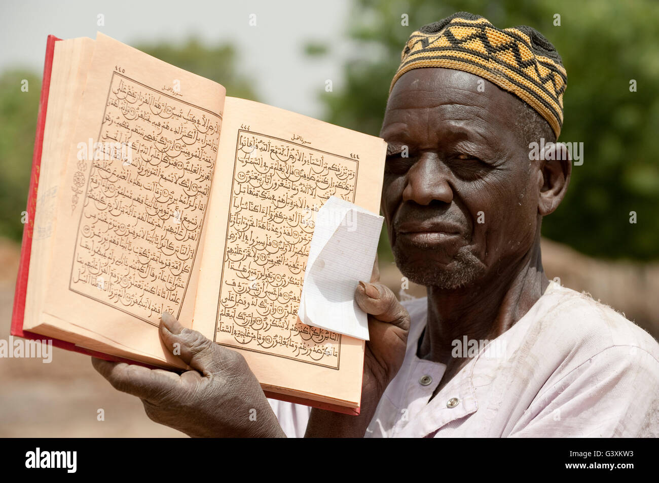 Mali, Imam with holy Koran book in arabic language Stock Photo