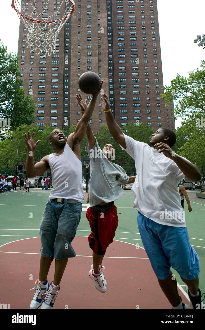 Players compete in the tryouts for the Rucker's street basketball tournament, at Rucker Park in Harlem, New York City, USA, Sund Stock Photo