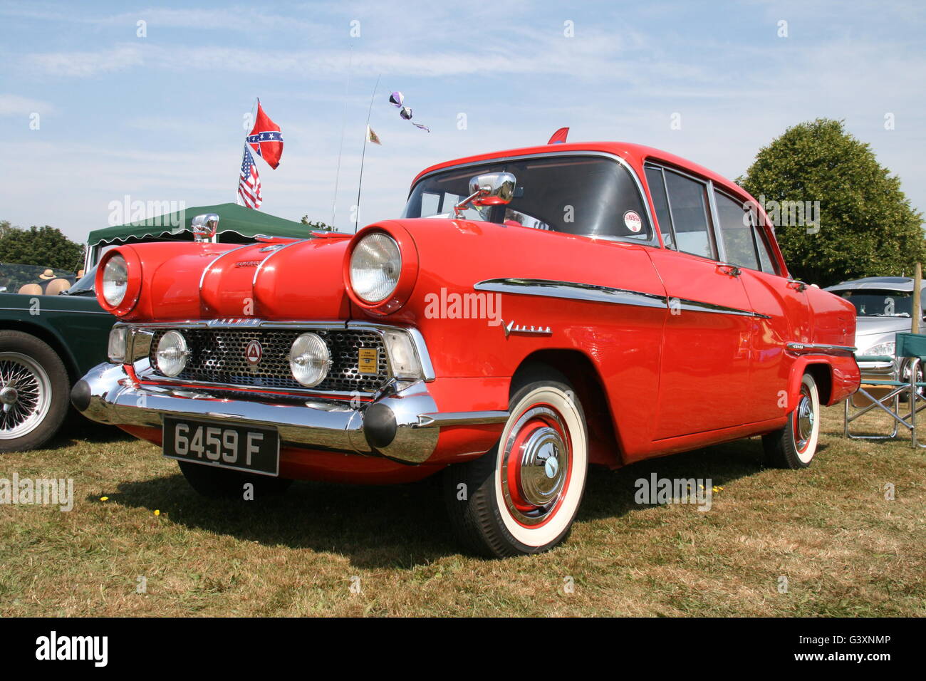 A VINTAGE VAUXHALL VICTOR CAR IN COLOUR GYPSEY RED AT A CLASSIC CAR SHOW Stock Photo