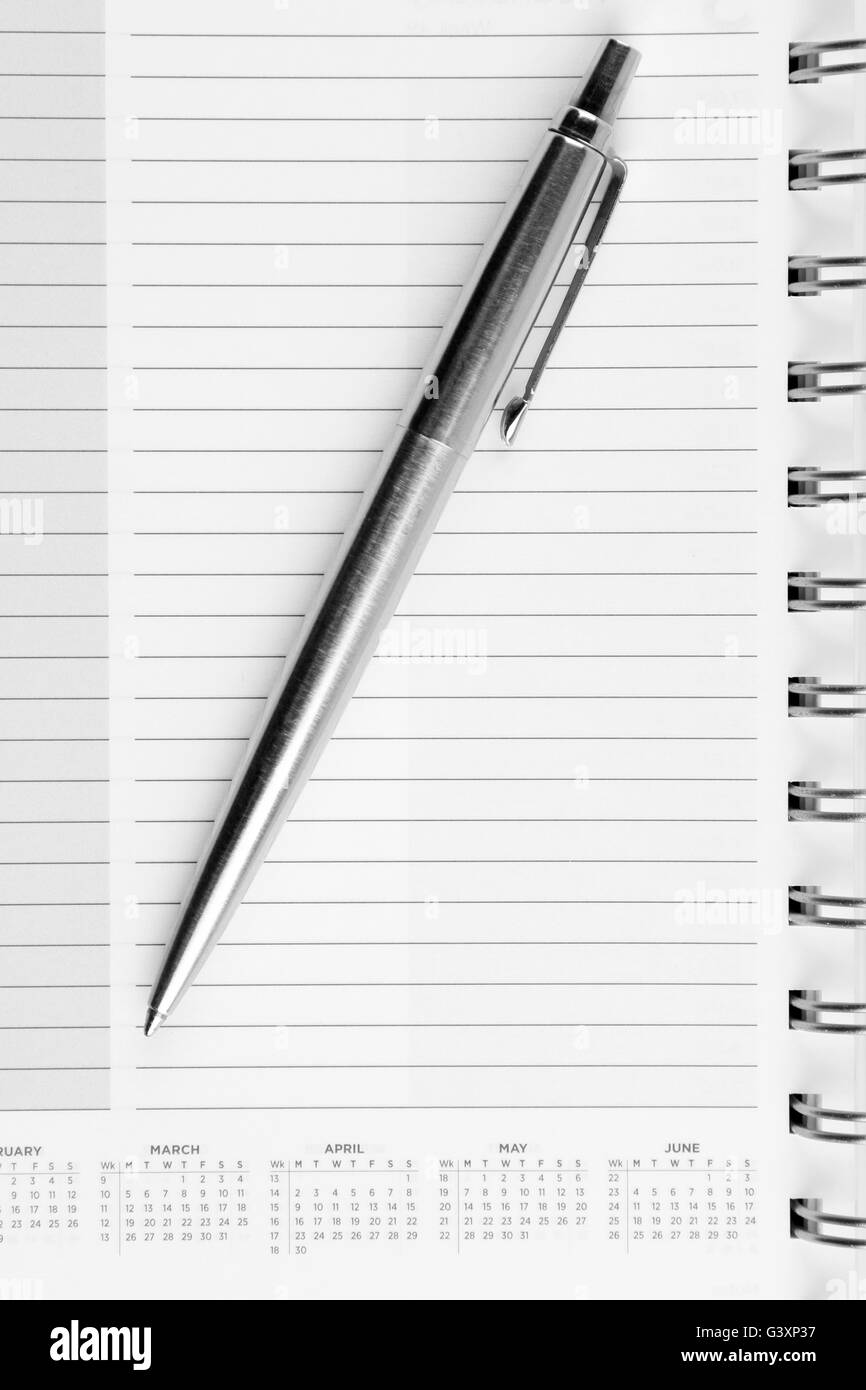 Pen on page in diary Stock Photo